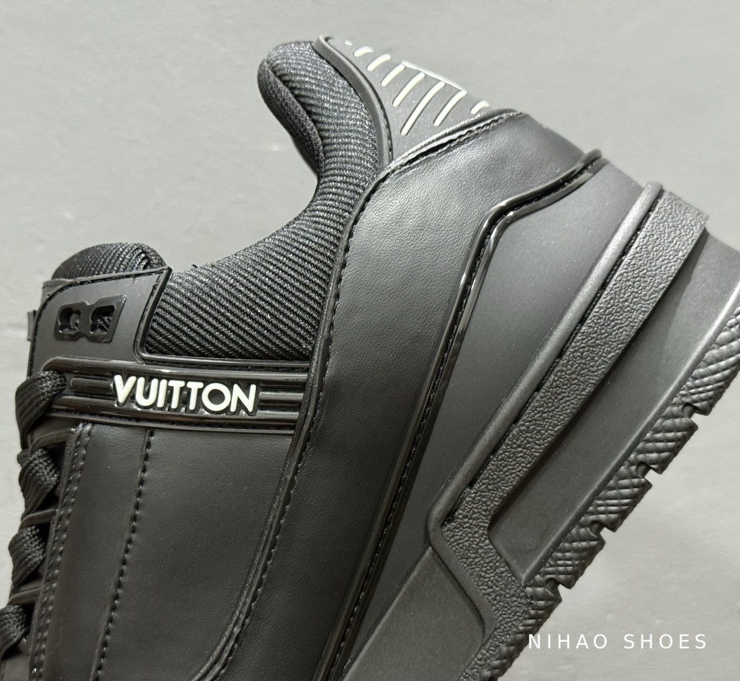 LV Trainer All Black — heel detail